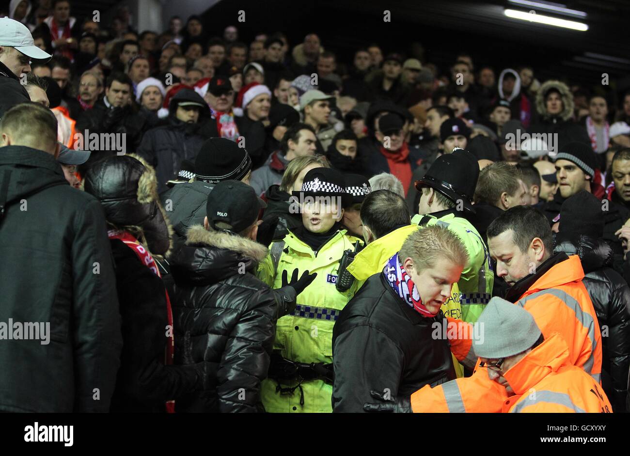 Fc utrecht fans with police and dtewards in the stands hi-res stock