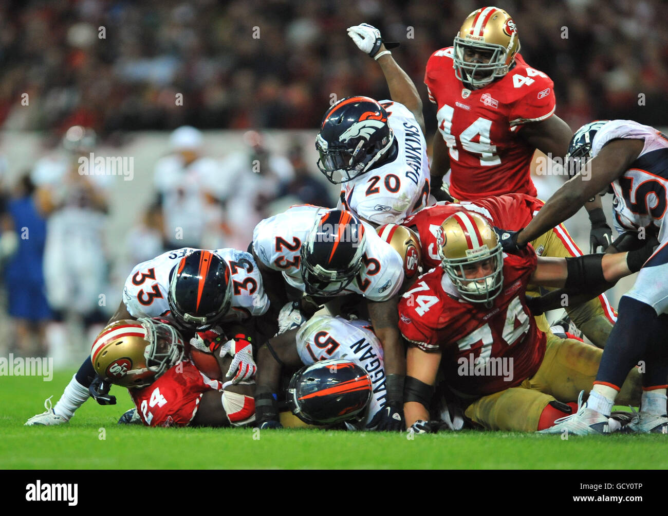 New York Giants' Brandon Jacobs skips through the Miami Dolphins' defence  during the NFC Eastern Division match at Wembley, London Stock Photo - Alamy