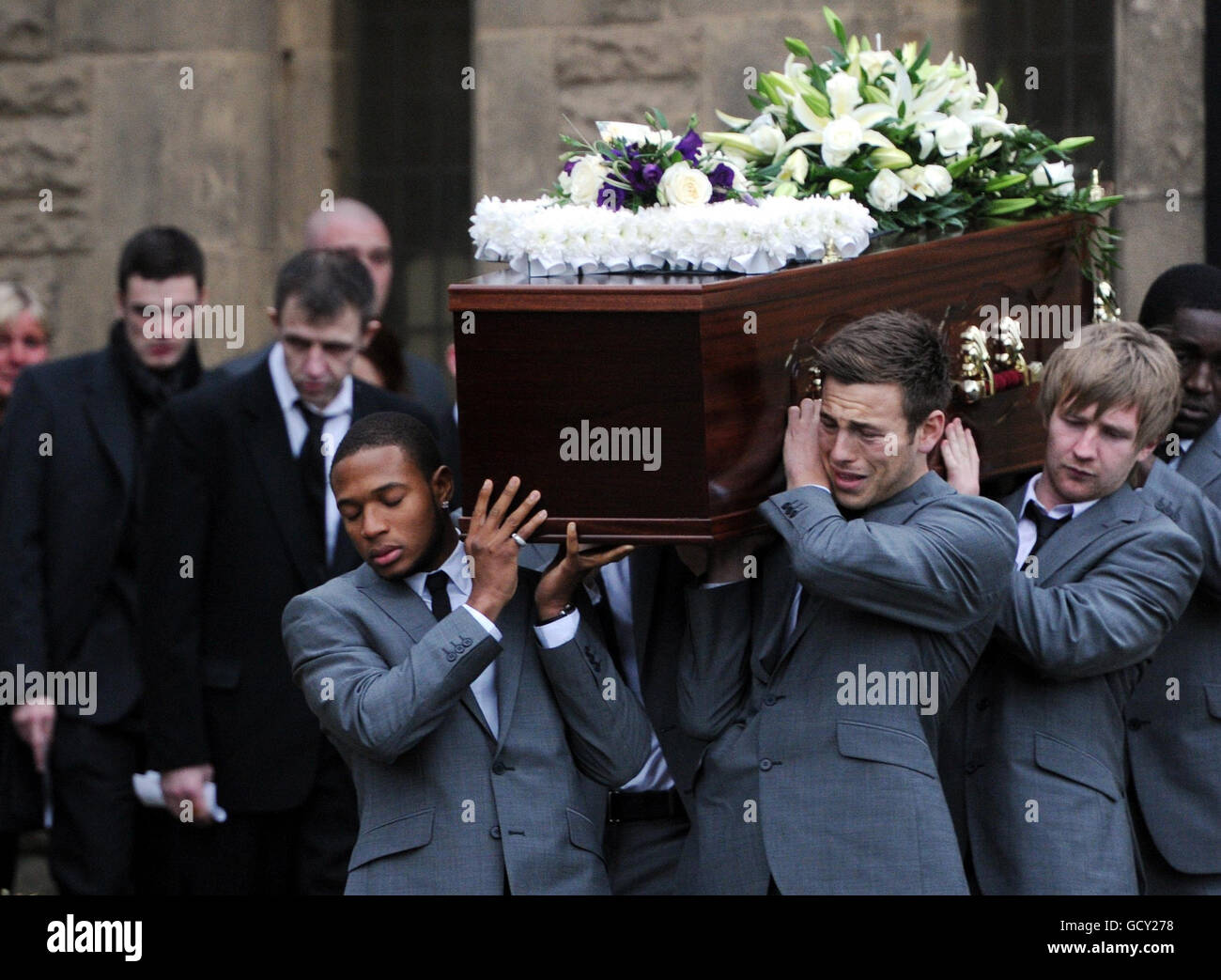 The coffin of Rushden and Diamonds goalkeeper Dale Roberts is carried from his funeral service at St Mary's Church, Horden, County Durham. Stock Photo