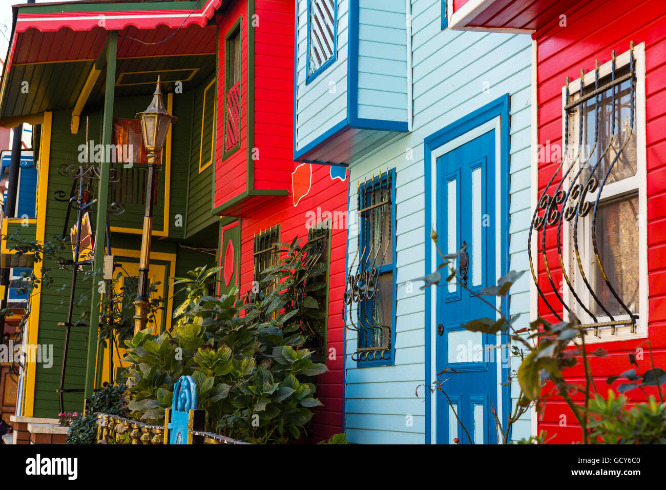 Decorated colorful wooden houses along Street in Istanbul old town Stock Photo