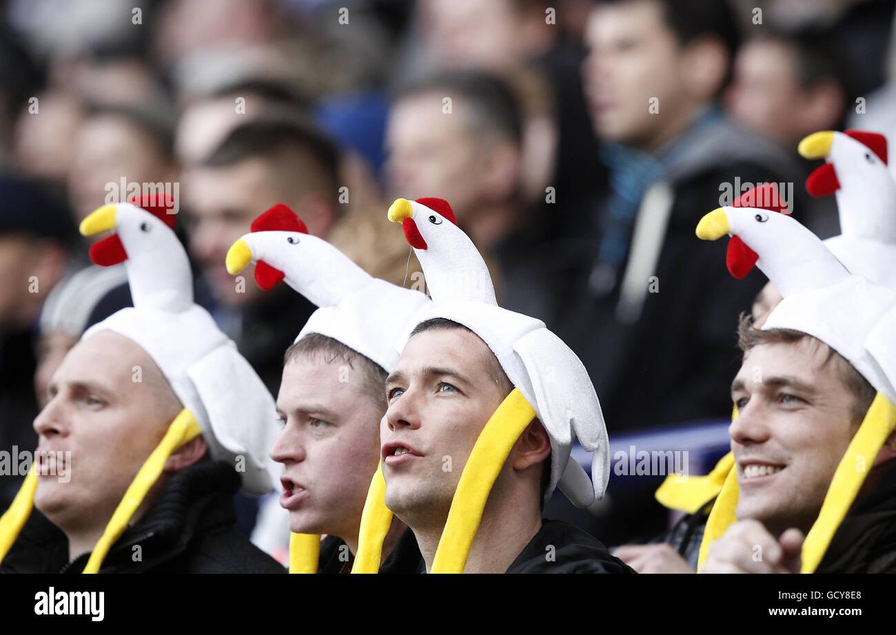Soccer - Barclays Premier League - Bolton Wanderers v Blackburn Rovers - Reebok Stadium. Fans in the stands with comical hats Stock Photo