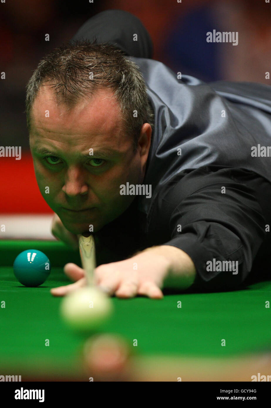 Scotland's John Higgins at the table during his win the final 10-9 over Wales' Mark Williams during the 12Bet.Com UK Championships at the Telford International Centre, Telford. Stock Photo