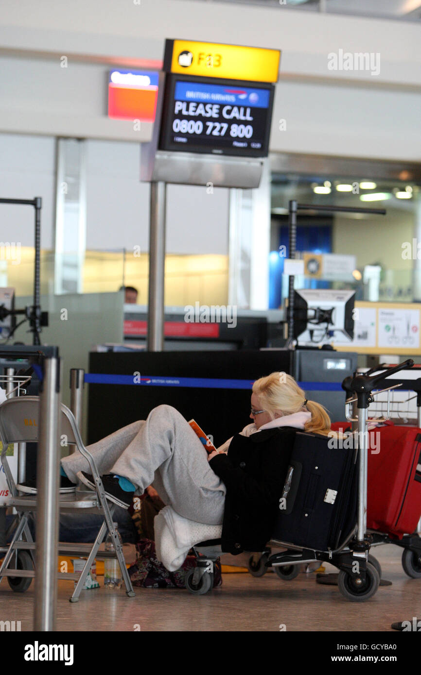 A general view of passengers at Terminal 5 of Heathrow Airport, after all flights at the airport were grounded. Stock Photo