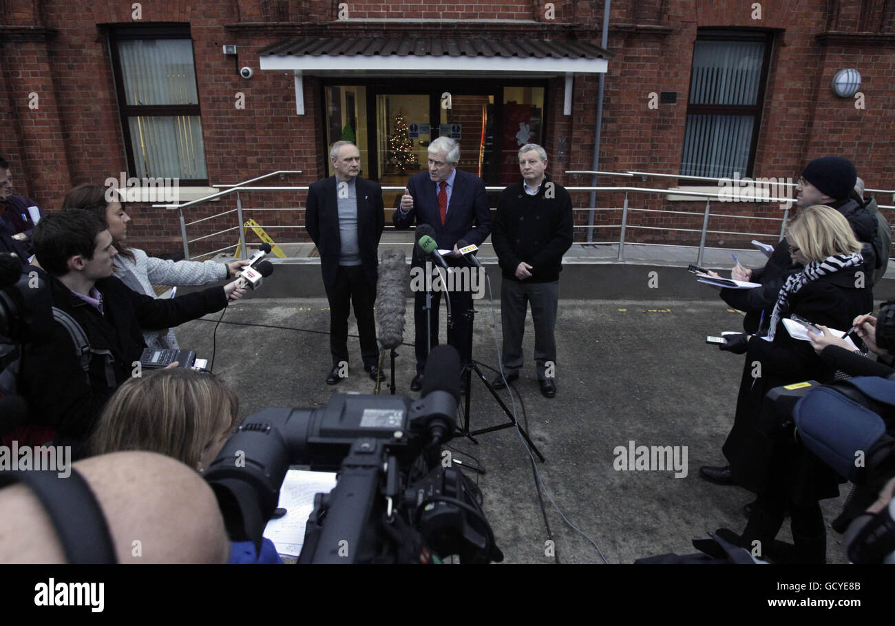 Senior figures from Northern Ireland Water (NIW) (left to right) Kevin Steele, Interim chairman Padraic White and Peter Bunting, speak to the media outside the company's headquarters in North Belfast as they emerge from a special board meeting to say their priority was to fix the leaks that have crippled the supply system. Stock Photo