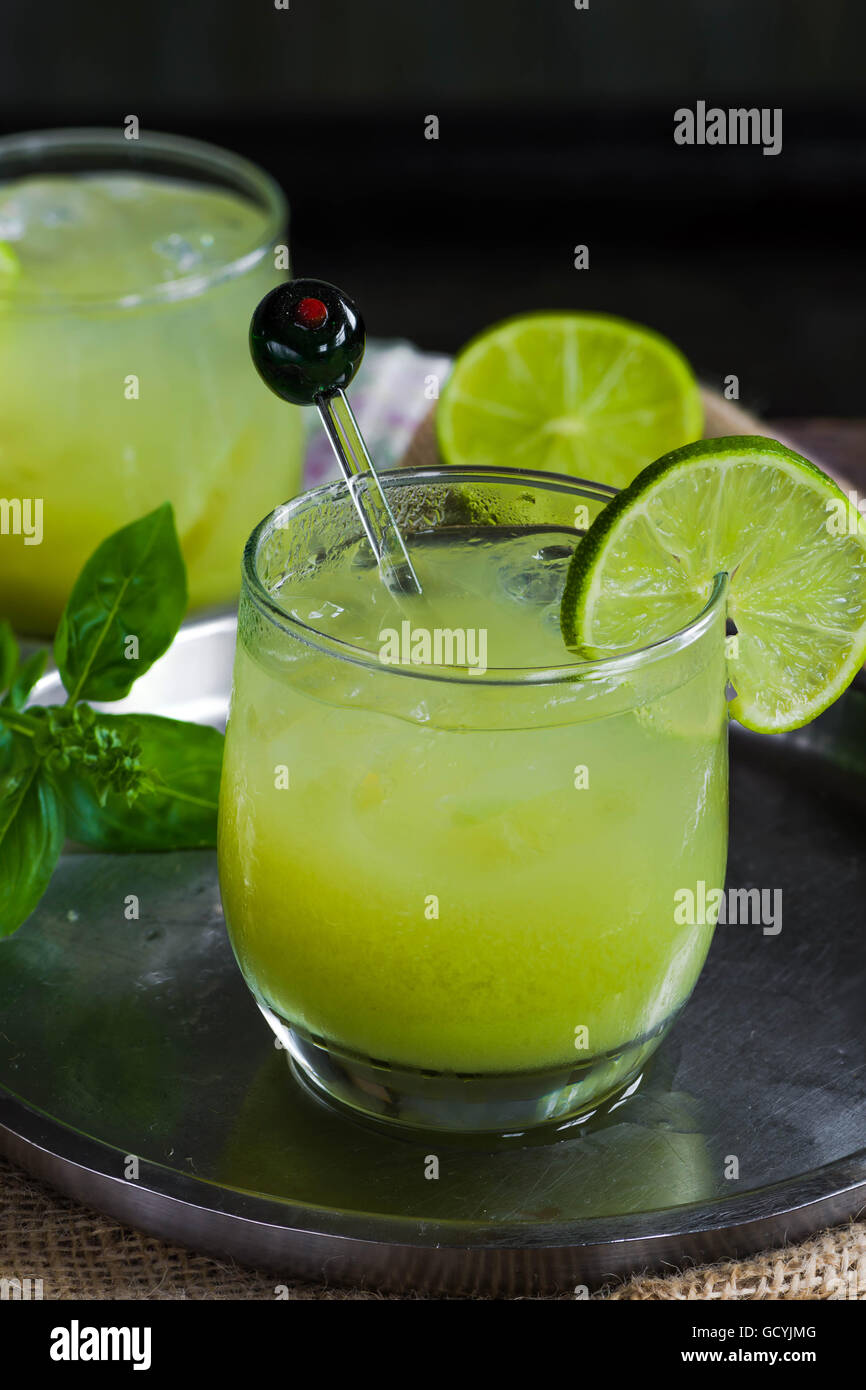 Iced green tea cocktail with tequila and lemon Stock Photo Alamy
