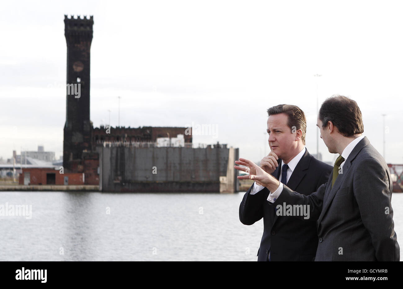 Richard Mawdsley (right) of Peel Holdings and Prime Minister David Cameron tour the 4.5 billion Wirral Waters development on Merseyside, one of Britain's biggest regeneration schemes. Stock Photo