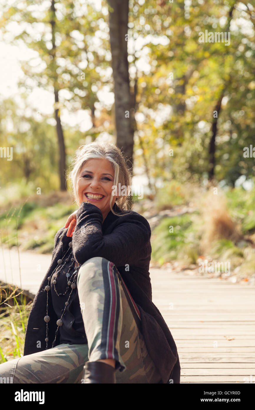 Fifty year old woman in outdoors Stock Photo Alamy