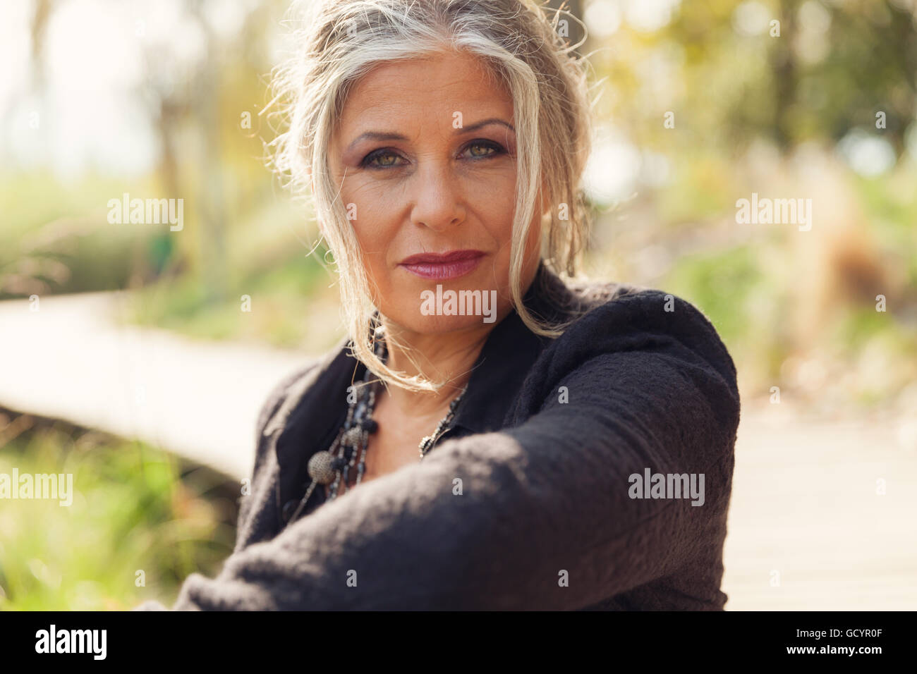 Fifty year old woman in outdoors Stock Photo Alamy