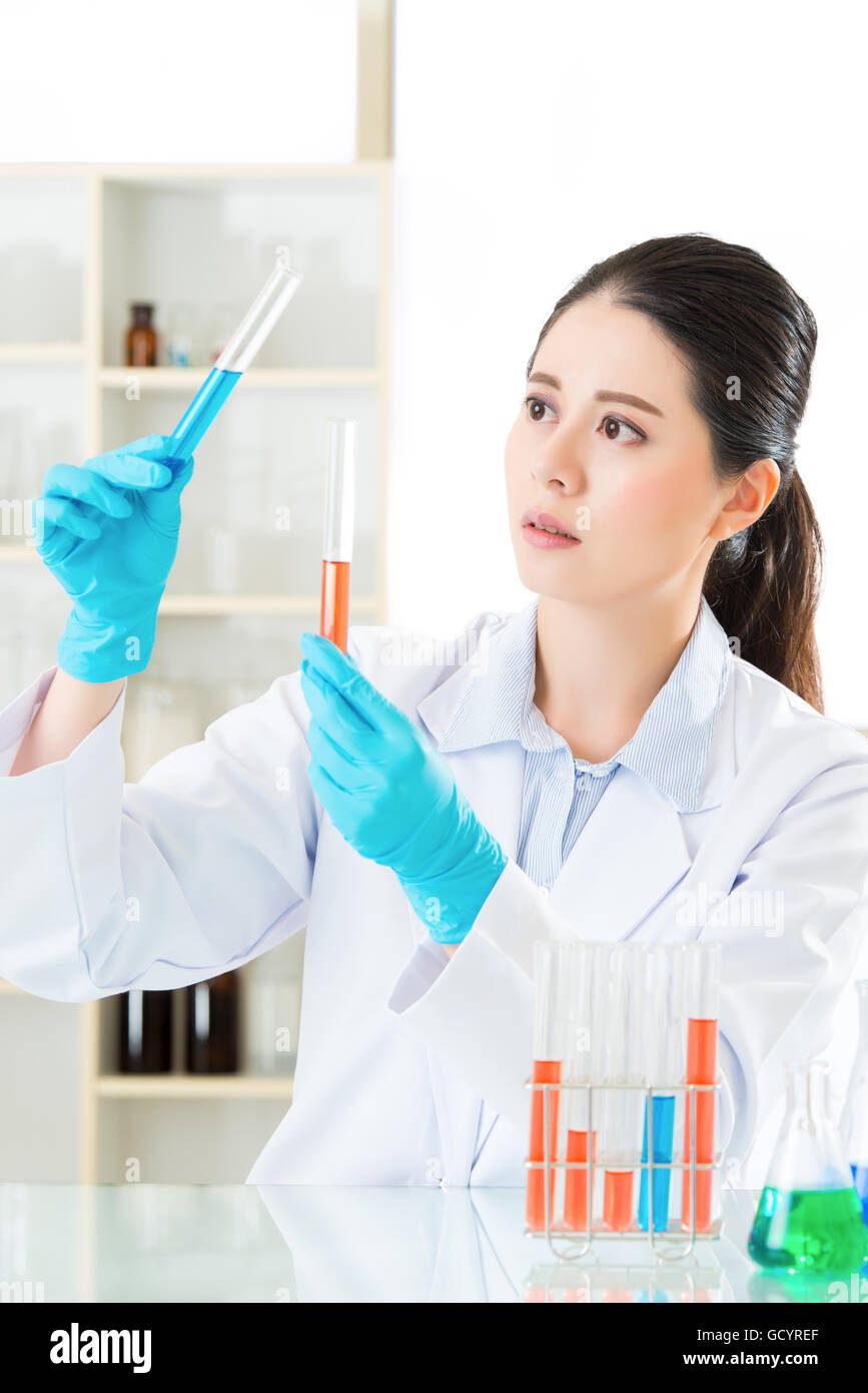 Asian female scientist Braving new medical frontiers in laboratory Stock Photo