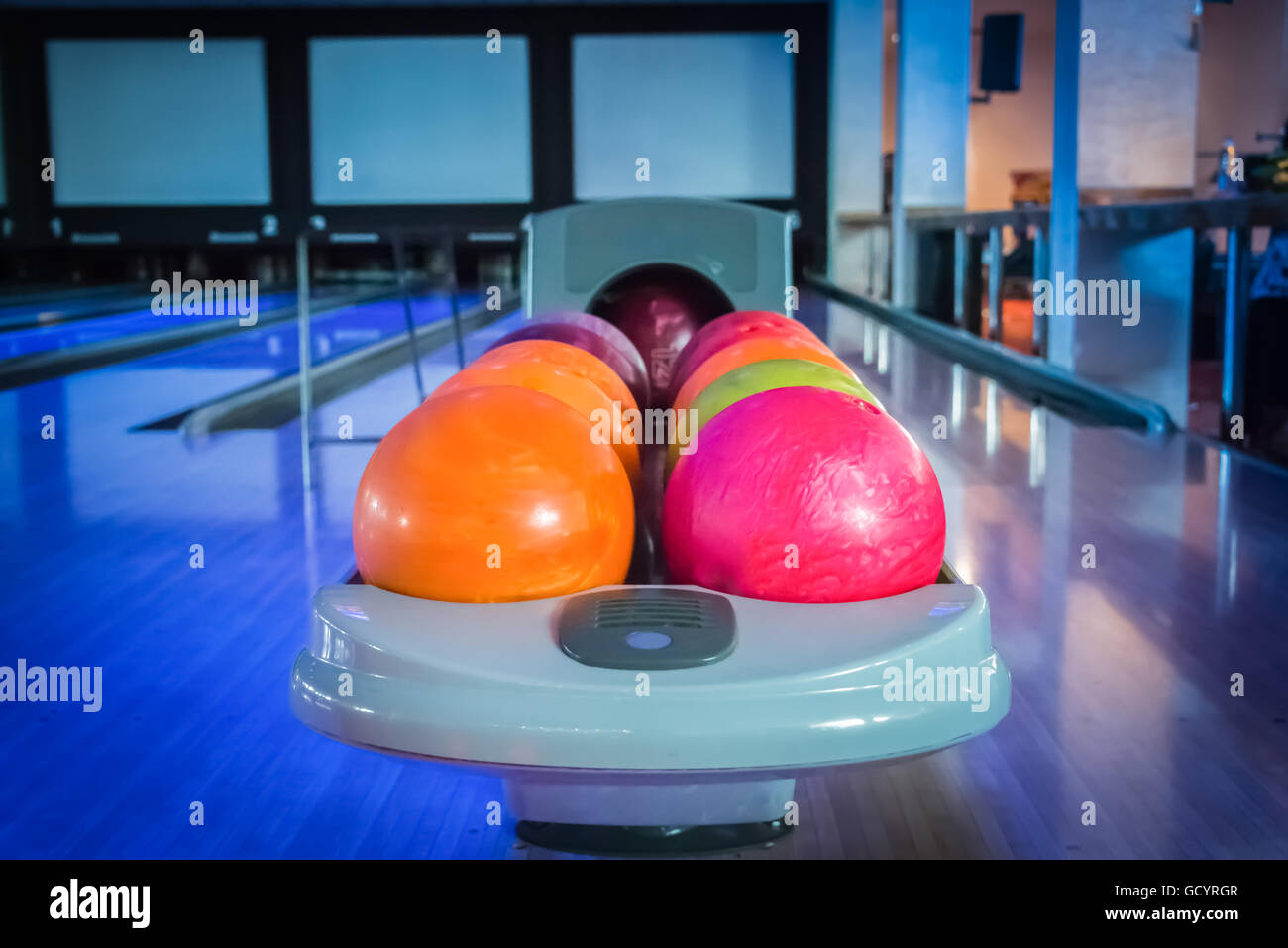 Colorful bowling balls on a stand Stock Photo Alamy