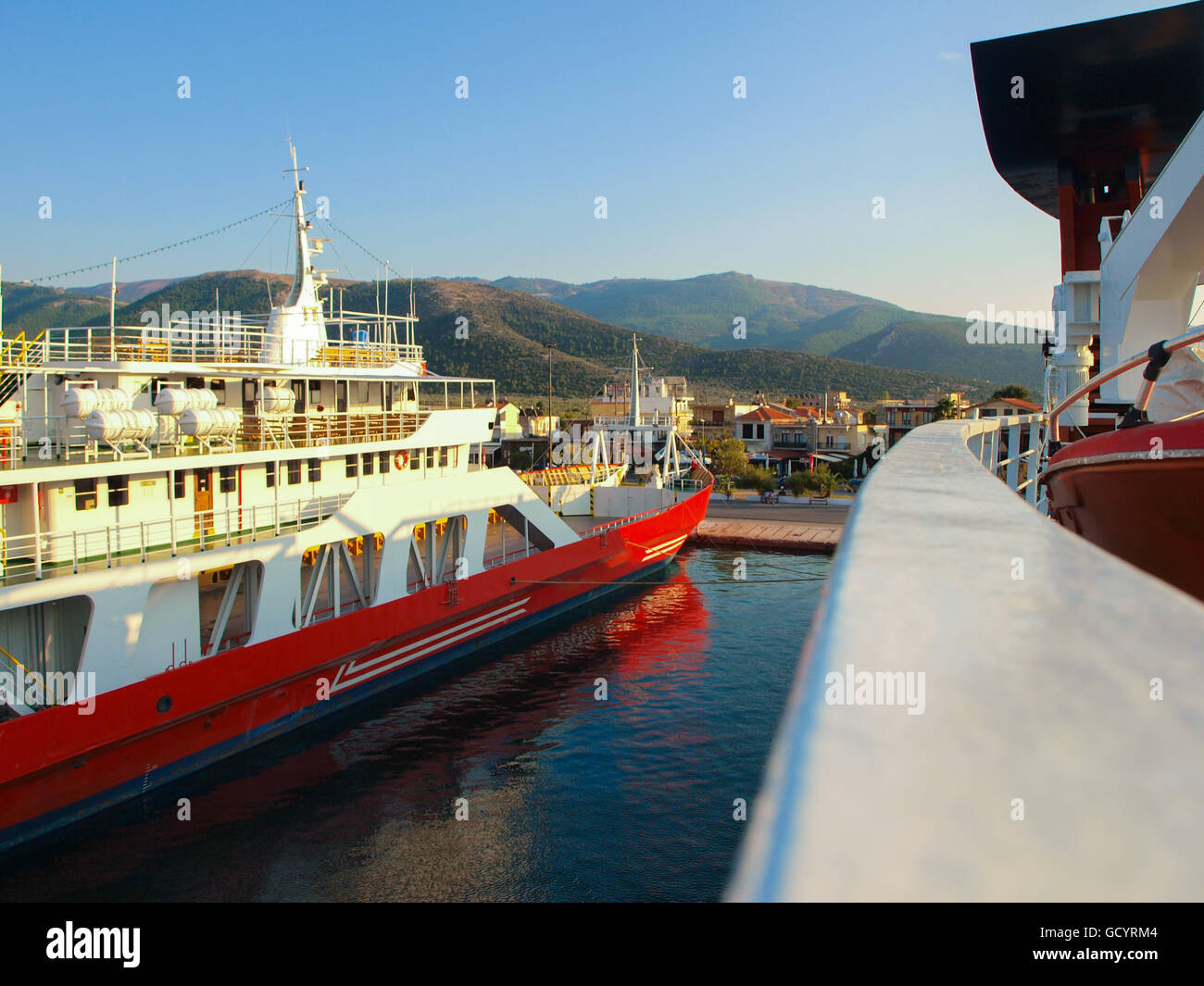Ferry boats moored at the Thasos beach, Greece Stock Photo