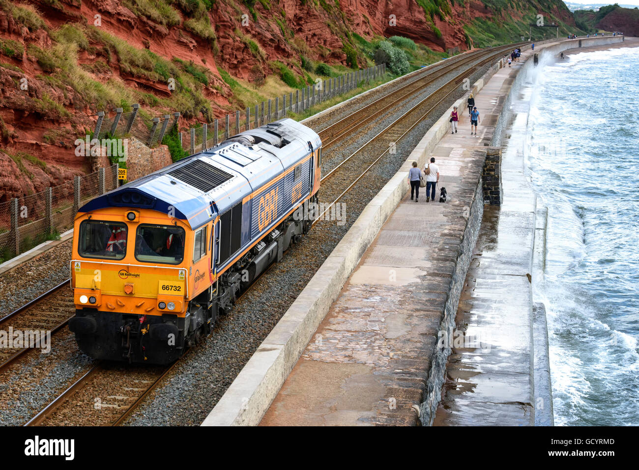 Class 66 diesel 66732 light engine along Sea Wall Dawlish