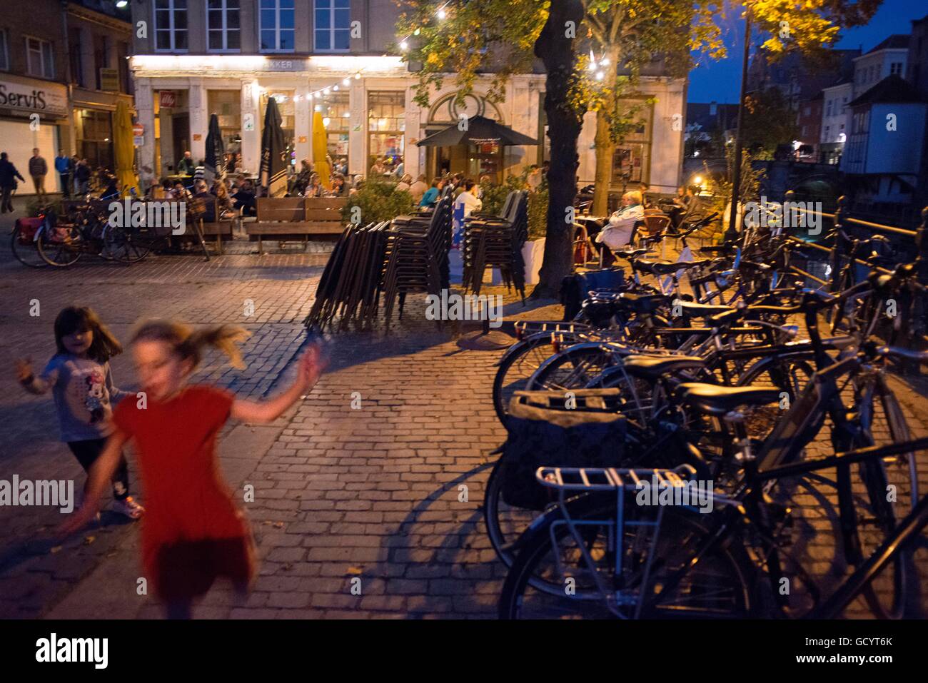 Bars and restaurant terraces Vismarkt, Mechelen (Malines) at night, Flanders, Belgium. Stock Photo