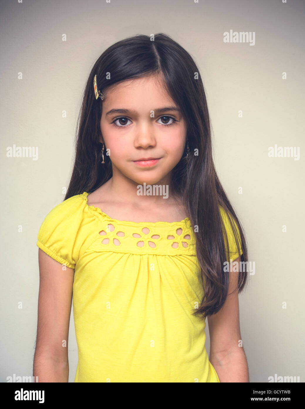 Young girl with brown hair acting Stock Photo
