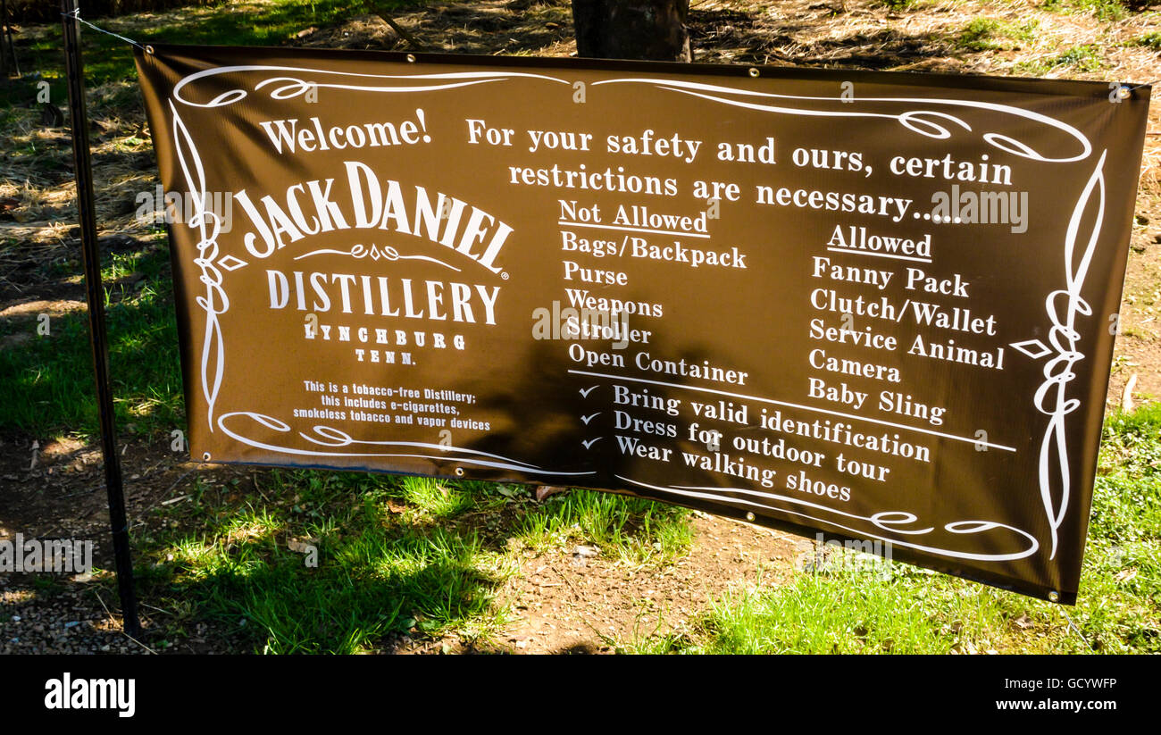 A brown banner sign with safety rules greets visitors at the