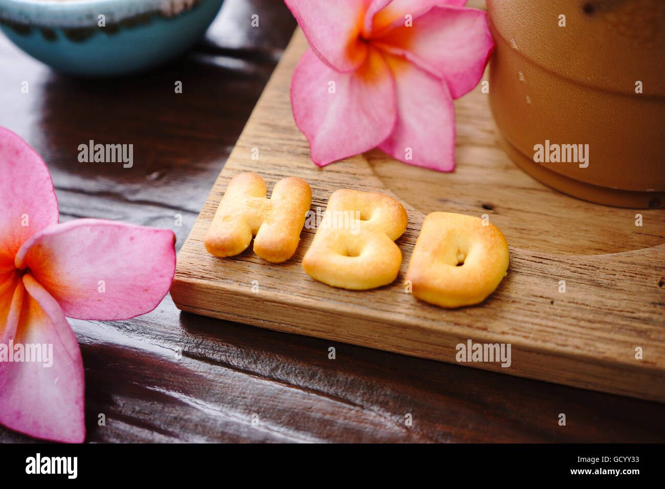 Iced Coffee And Biscuit Alphabet Spell Hbd With Rice Field Background Stock Photo Alamy