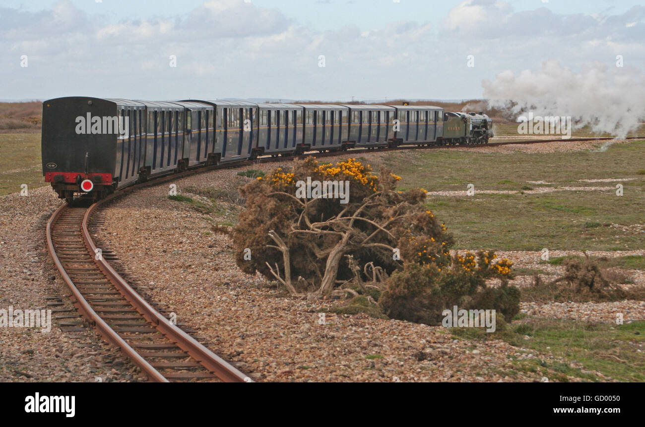Romney Hythe and Dymchurch Railway train leaves Dungeness Stock Photo