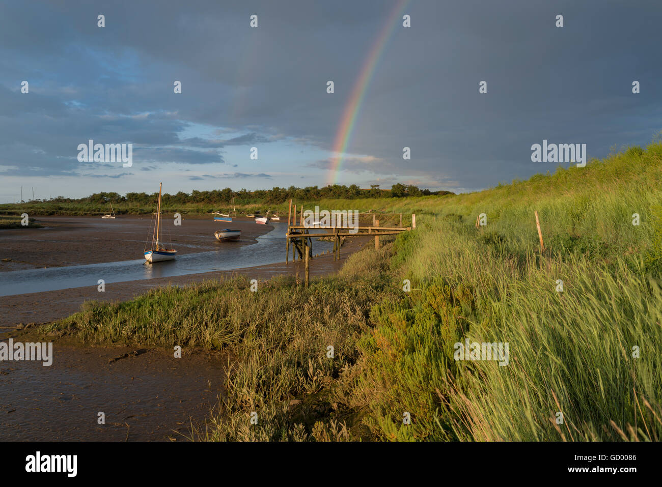 Evening light at low tide at Stiffkey Freshes in North Norfolk, England. Stock Photo