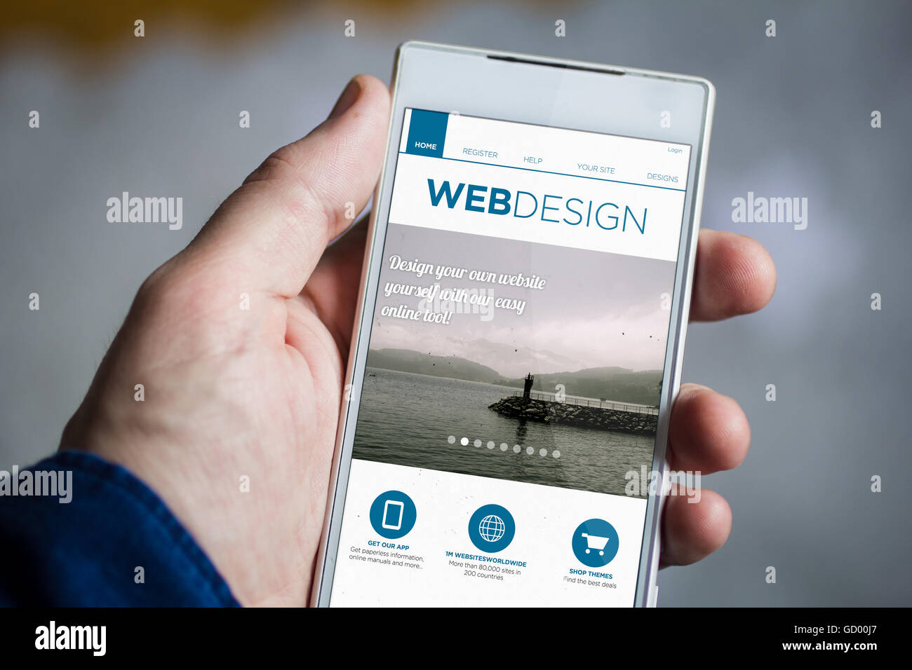 man hand holding web design smartphone. All screen graphics are made up ...