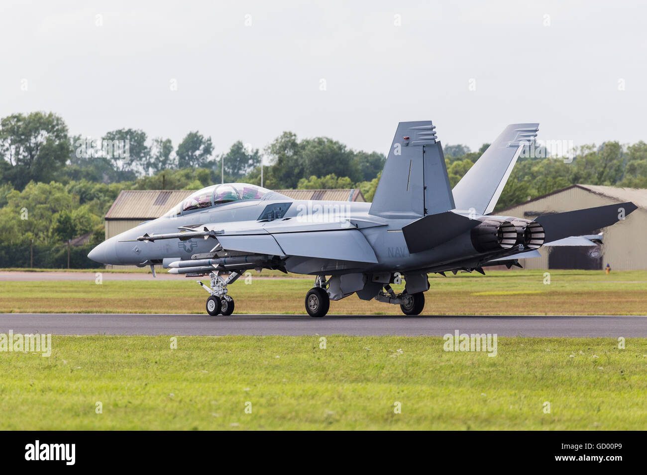 F/A-18 Super Hornet slows on the runway pictured at the 2016 Royal International Air Tattoo. Stock Photo