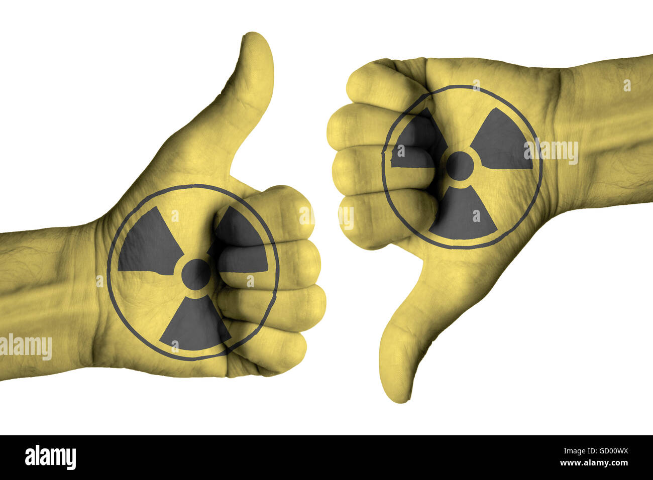 Nuclear icon on male thumb up and down hand Stock Photo