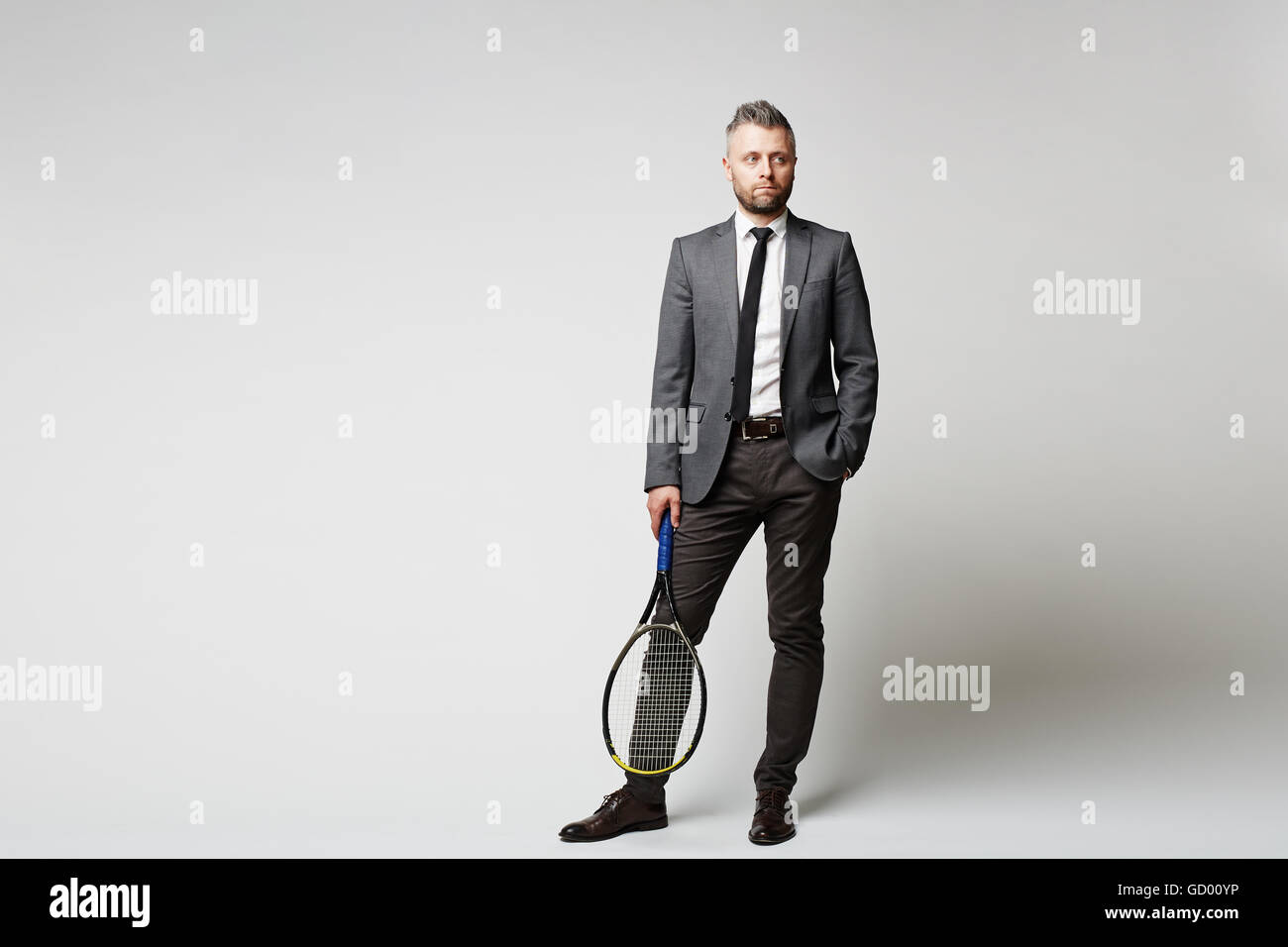 Man With Racket Man with racket Stock Photo - Alamy