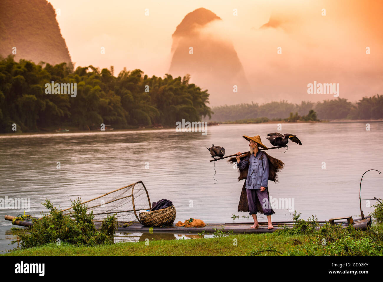 Traditional Chinese cormorant fisherman on the Li River in Yangshuo
