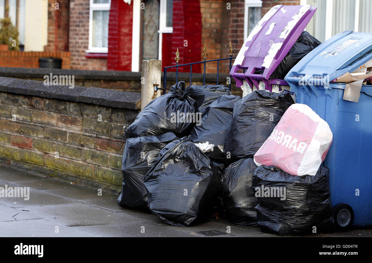 Refuse waiting to be collected in Liverpool, Merseyside. Local councils have been accused of complacency over rubbish collection, amid growing public anger that bins in some areas have not been emptied for as long as four weeks. Stock Photo