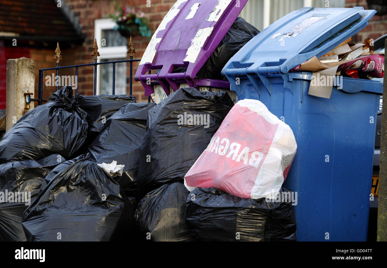Refuse waiting to be collected in Liverpool, Merseyside. Local councils have been accused of complacency over rubbish collection, amid growing public anger that bins in some areas have not been emptied for as long as four weeks. Stock Photo
