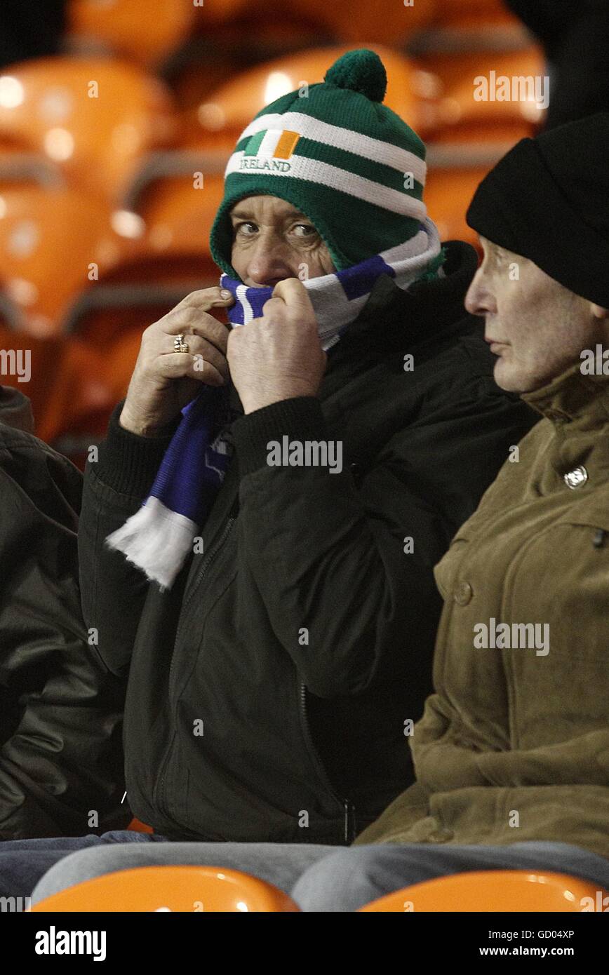Soccer - Barclays Premier League - Blackpool v Birmingham City - Bloomfield Road. A cold Birmingham City fan in the stands Stock Photo