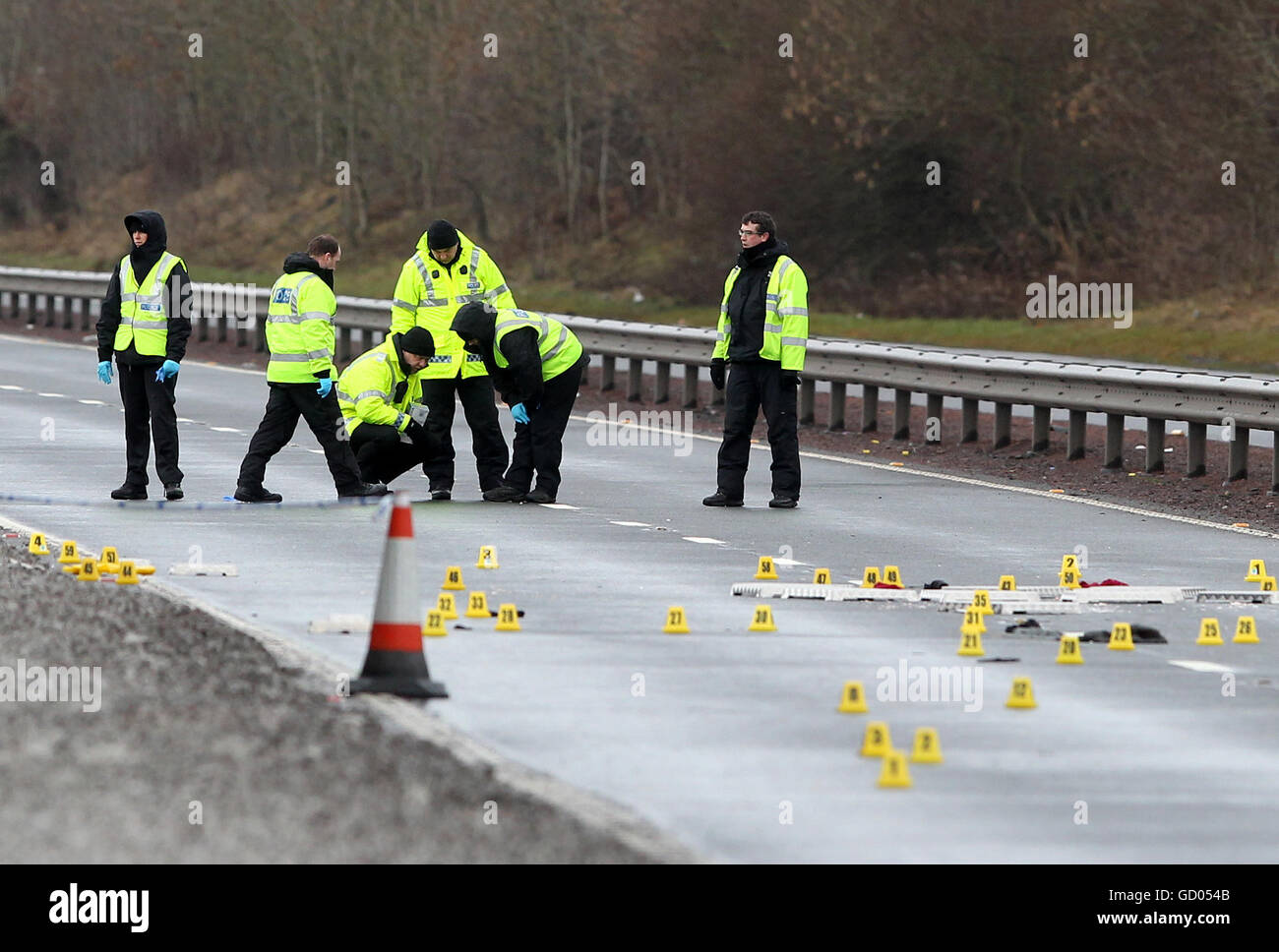 Tayside Police investigation team search the southbound carriageway of the A9 near Auchterarder after a 16 year old girl died after being hit by a car last night. Stock Photo