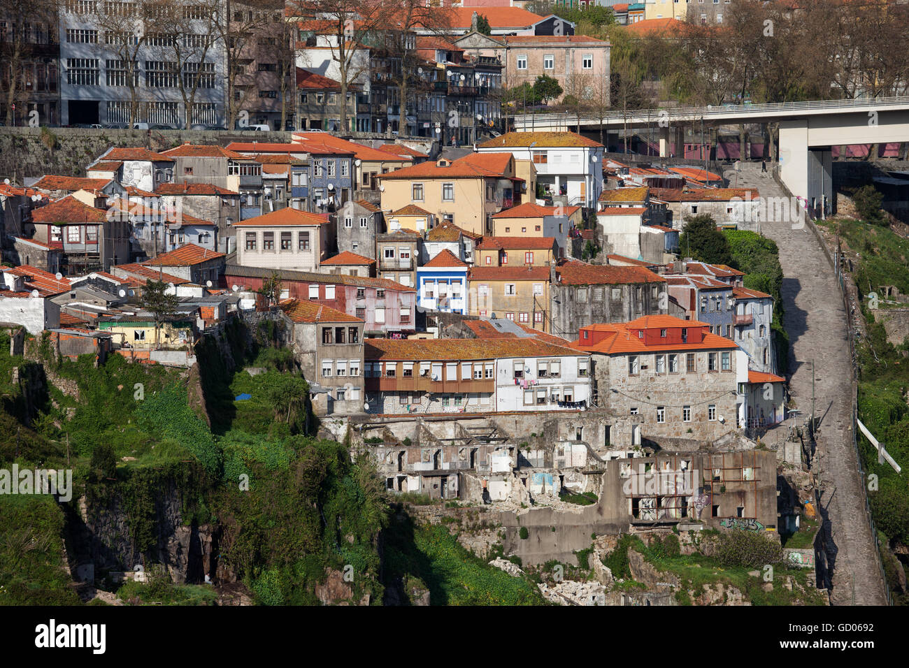 Old houses on steep hillside in city of Porto in Portugal, Calcada das Carquejeiras on right Stock Photo