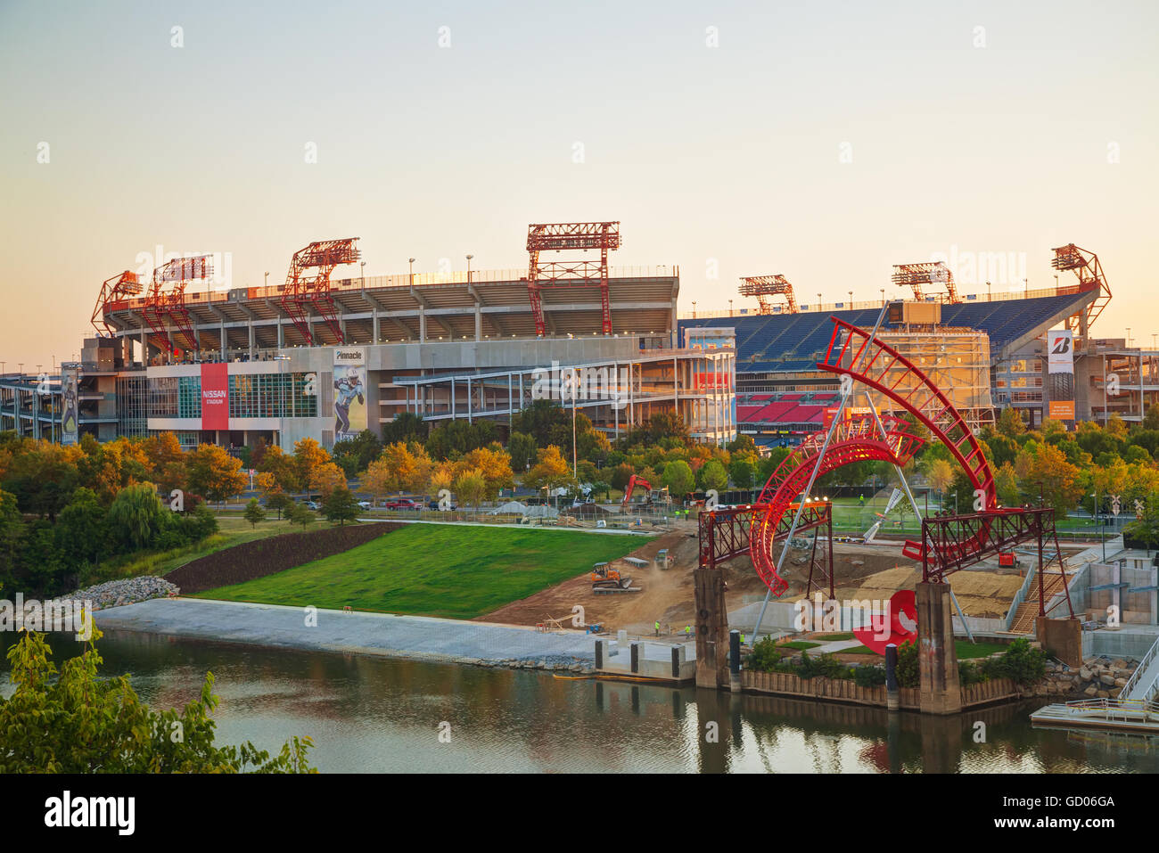 View across the Cumberland River in downtown Nashville TN towards the NFL  team Titans' Nissan stadium with Ghost Ballet art Stock Photo - Alamy