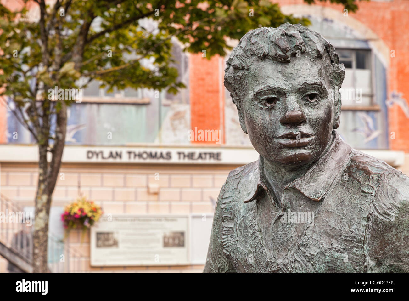 Swansea, Wales: 1 July 2016 - Sculpture of Dylan Thomas by John Doubleday, in front of the Dylan Thomas Theatre, Swansea Marina, Stock Photo