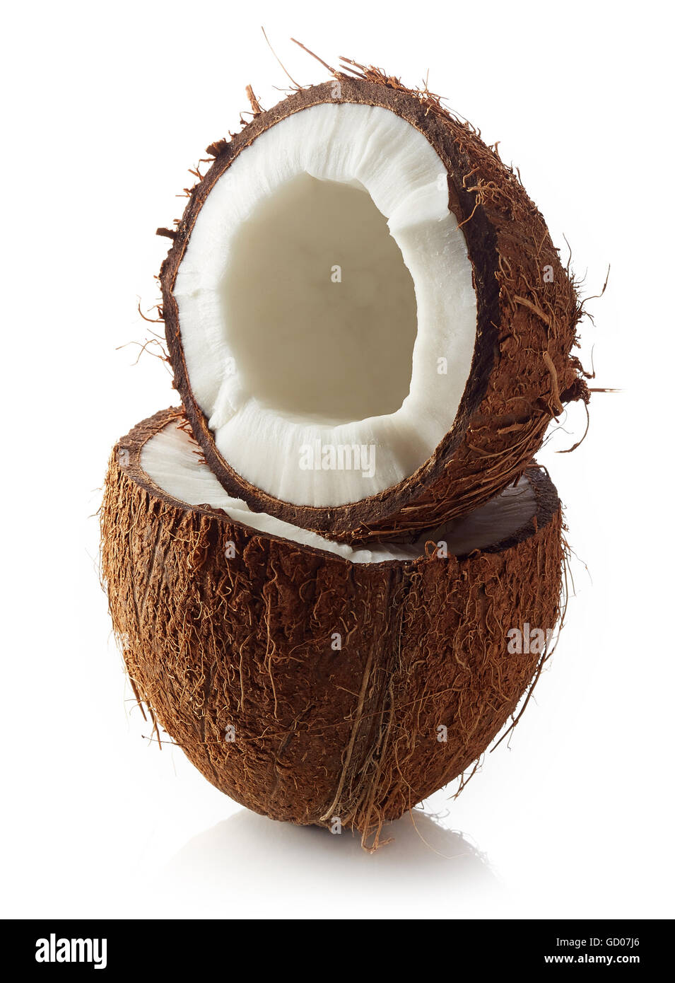 Coconut halves isolated on white background Stock Photo