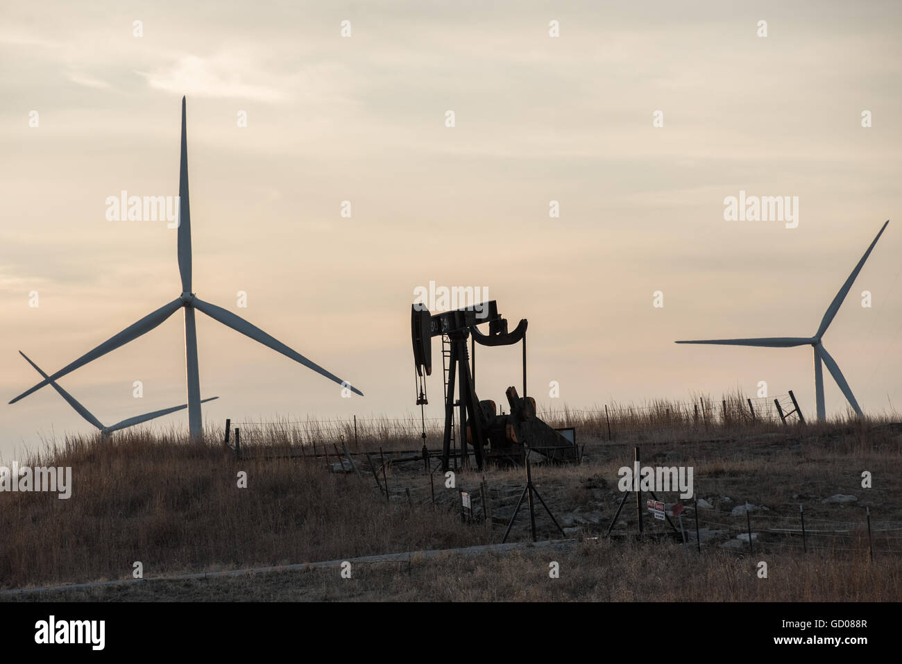 Fossil fuels vs. clean renewable wind energy Stock Photo Alamy