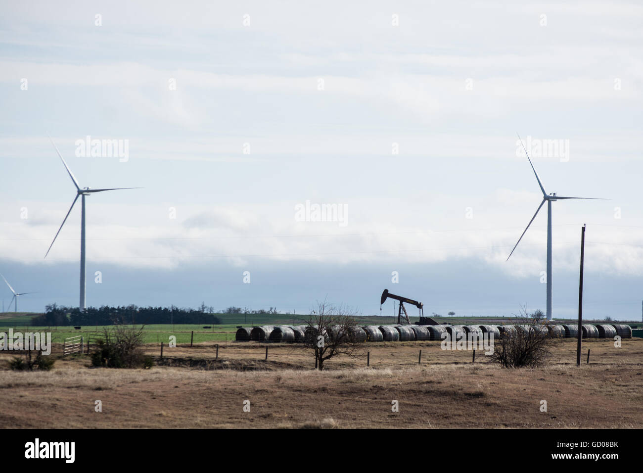 Fossil fuels vs. clean renewable wind energy Stock Photo Alamy