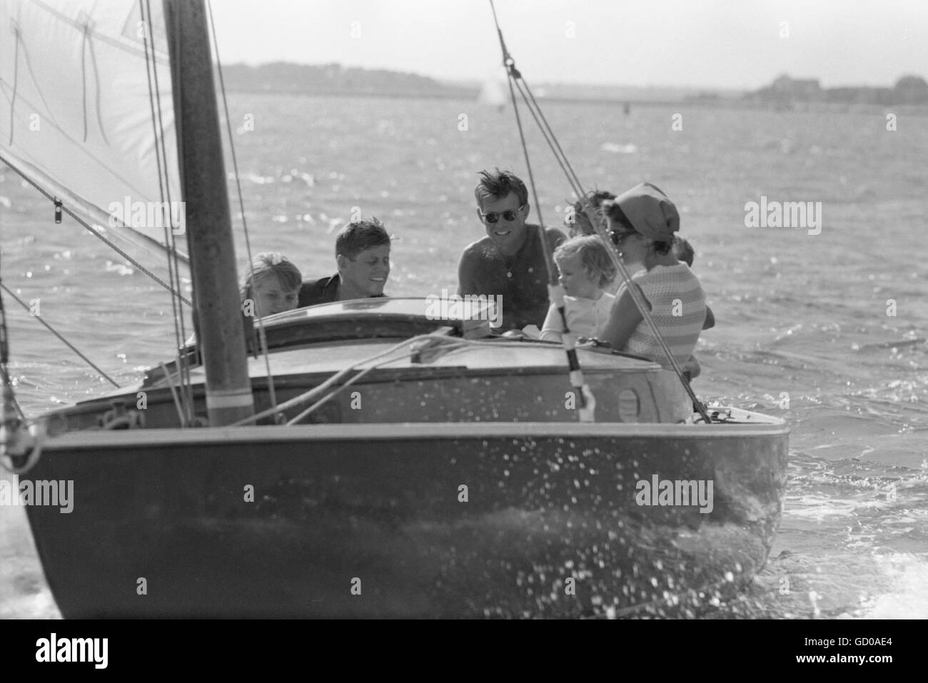 John F. Kennedy sailing on the Victura with Jackie and Bobby Stock Photo