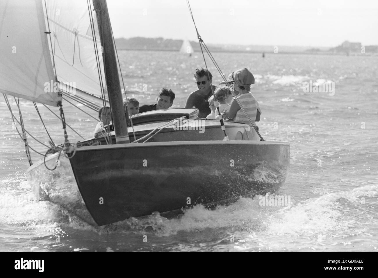 John F. Kennedy sailing on the Victura with Jackie Stock Photo