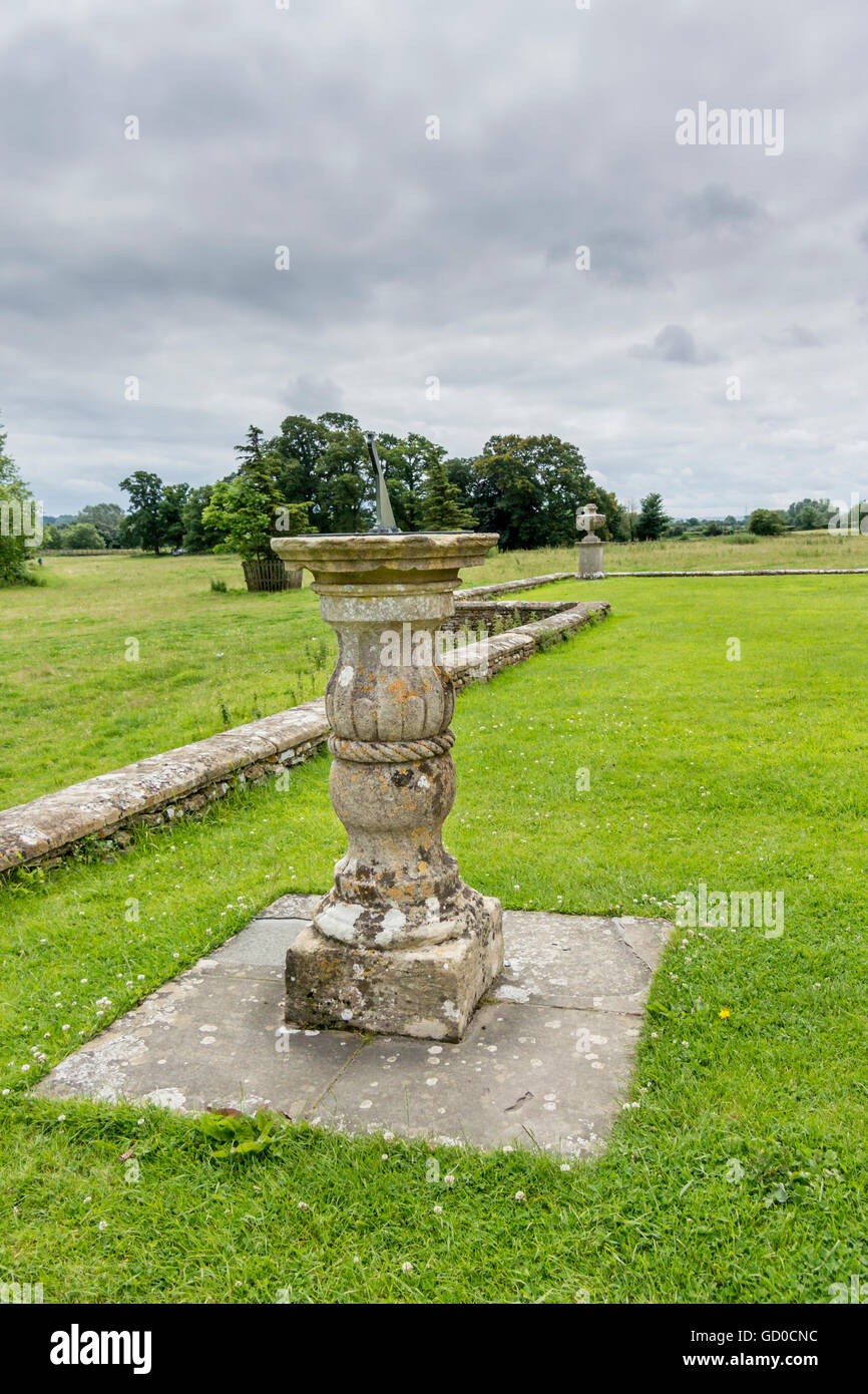 Sun dial on the lawn in the gardens of Lacock Abbey, Lacock, Wiltshire