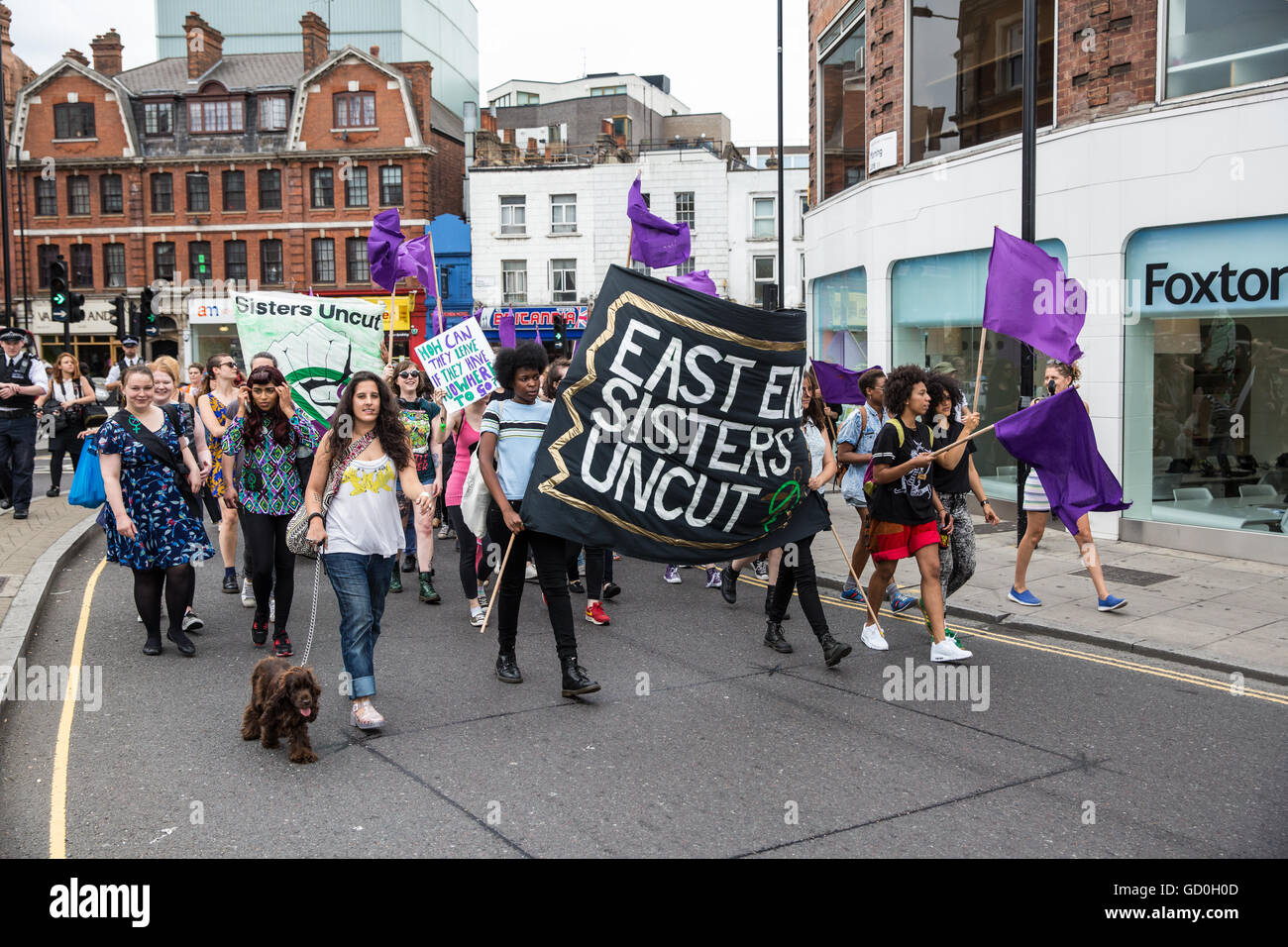 London, UK. 9th July, 2016. Members of feminist direct action group Sisters Uncut march in Hackney to call on both Hackney Council and the Government not to implement the Housing Act, to cease the demolition of council housing and to invest funds in both social housing and refuges for women fleeing domestic violence. The protest took the form of a march to a social housing block currently being occupied - a protest occupation - by Sisters Uncut. Credit: Mark Kerrison/Alamy Live News Stock Photo