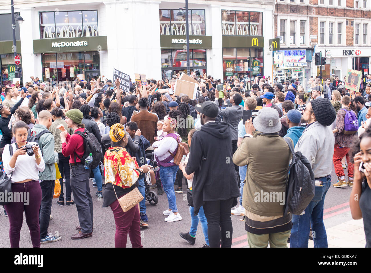 Brixton, London, UK. 9th July 2016. Hundreds of Black Lives Matter Supporters during a sit-in protest on Brixton High Street which brought London streets to standstill. The march is in response to the fatal shootings of Philando Castile in Minnesota and Alton Sterling in Louisiana. Credit:  Nicola Ferrari/Alamy Live News. Stock Photo