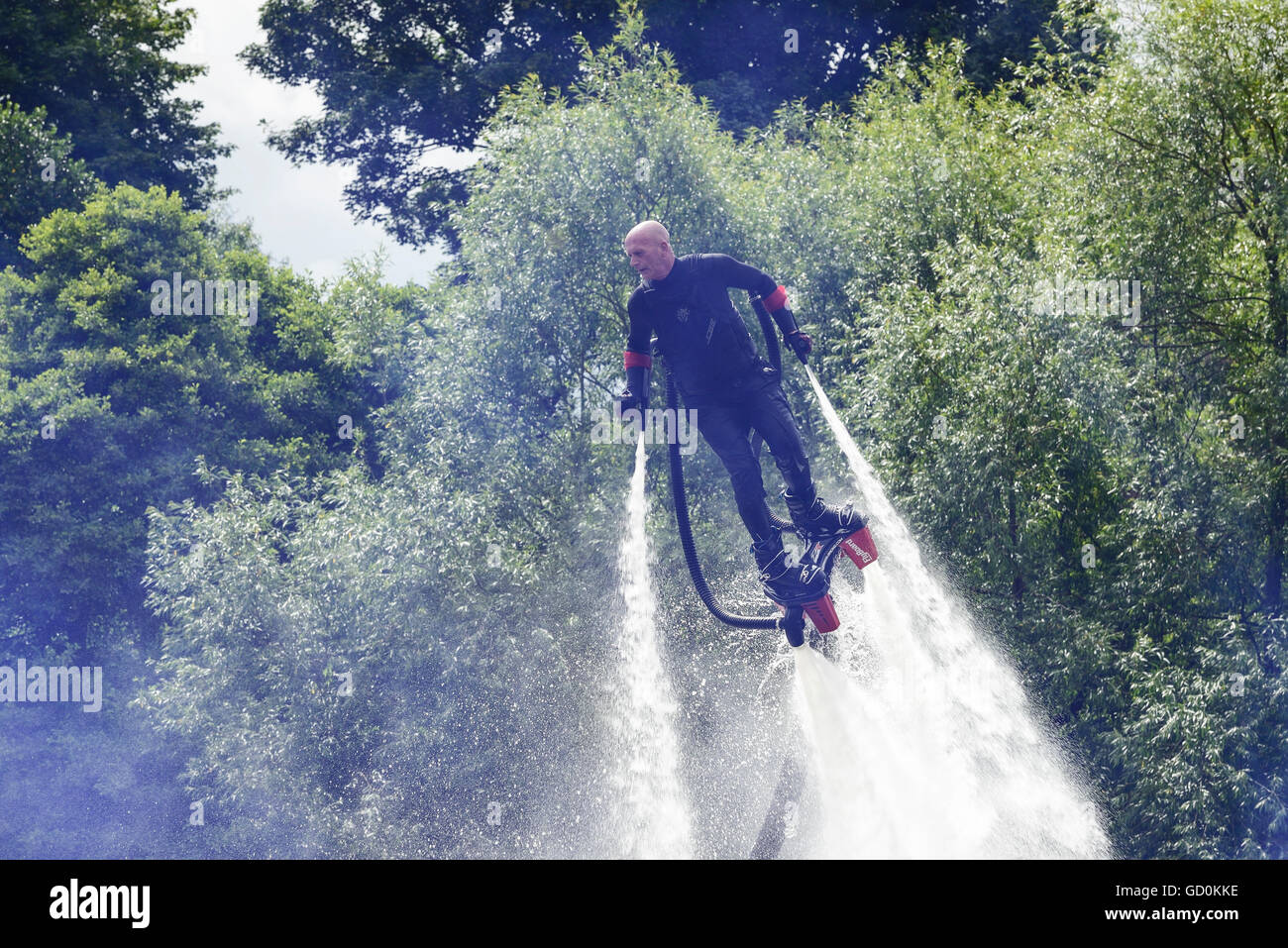 Chester, UK. 10th July 2016. UK Fly-board Champion Jay St John at the annual Charity Raft Race on the River Dee organised by Chester Rotary Club. Chester, UK. Andrew Paterson/Alamy Live News Stock Photo