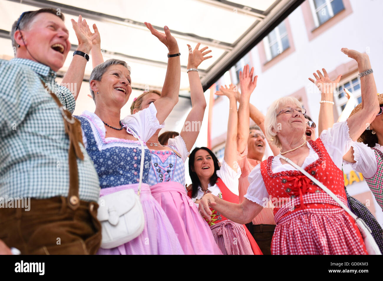 Women in traditional Dirndl dress take part in a world record attempt ...