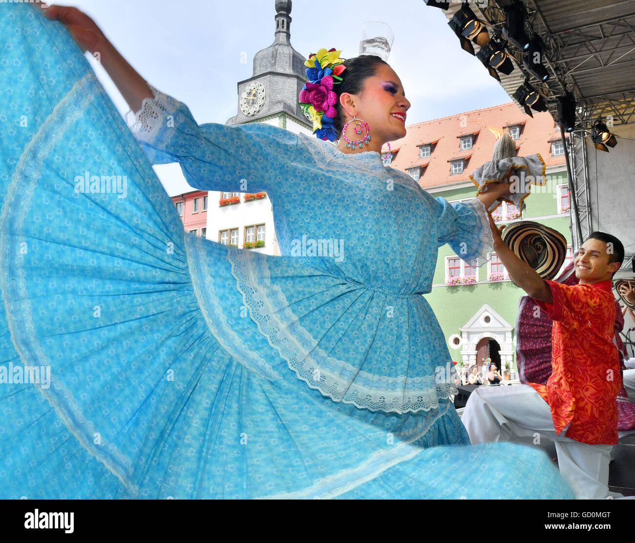 Rudolstadt, Germany. 10th July, 2016. Dancers of Grupo de Baile Otrora Boyaca from Colombia performing at the Marktplatz for the Rudolstadt Festival 2016 in Rudolstadt, Germany, 10 July 2016. The ogranisors estimate around 90 000 visitors have visited Germany's biggest festival of folk and world music in Rudolstadt. Since 07 July more than 300 concerts and workshops from artists from more than 40 countries have taken place over more than 20 platforms. Photo: MARTIN SCHUTT/dpa/Alamy Live News Stock Photo