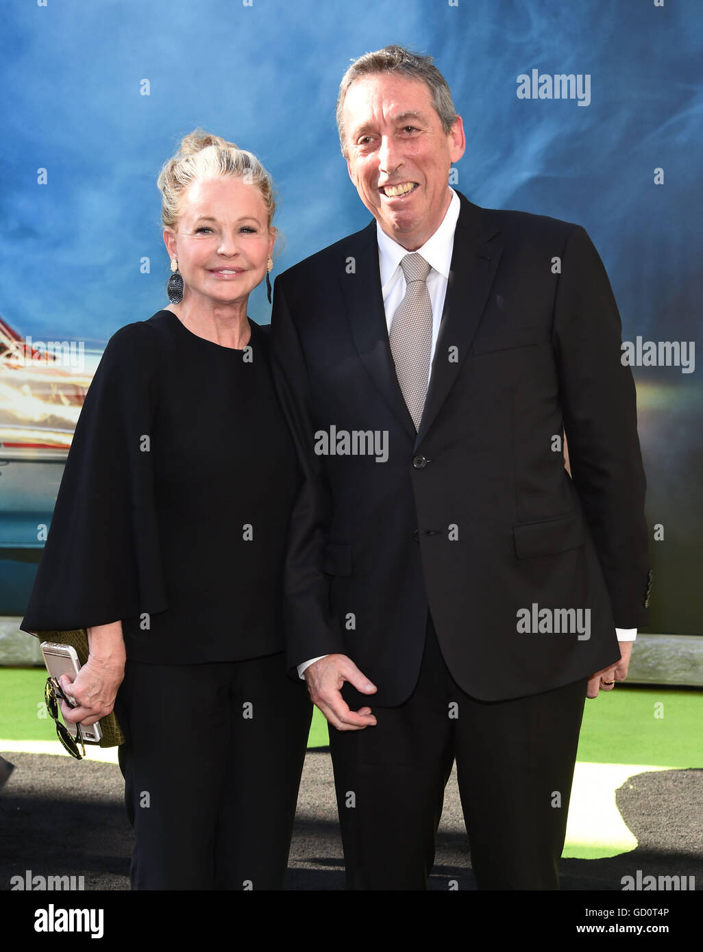 Hollywood, California, USA. 9th July, 2016. Ivan Reitman & Genevieve Robert arrives for the premiere of the film 'Ghostbusters' at the Chinese Theatre. © Lisa O'Connor/ZUMA Wire/Alamy Live News Stock Photo