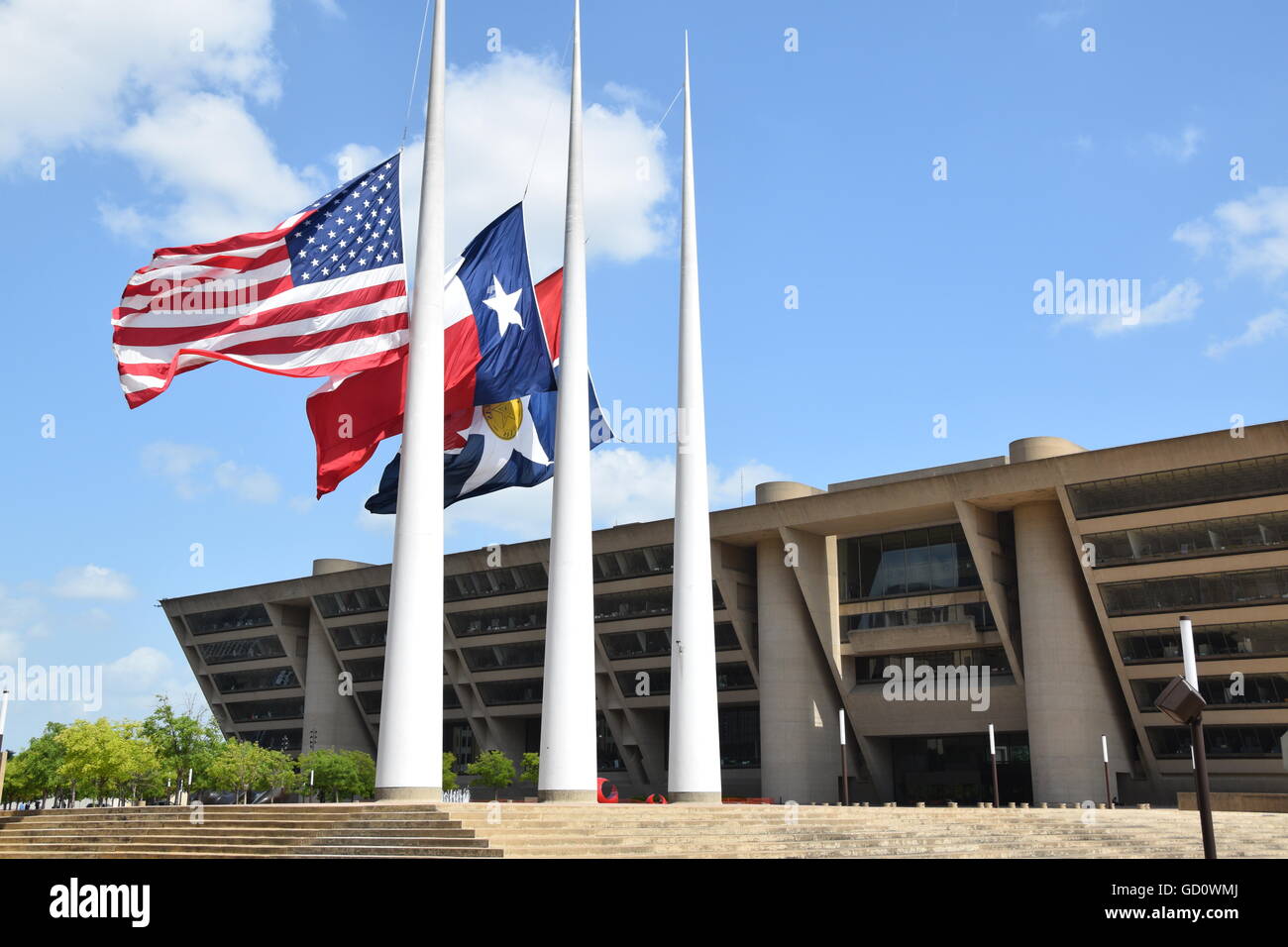 Dallas, Texas, USA. 10th July, 2016. Flags at half staff at Dallas City
