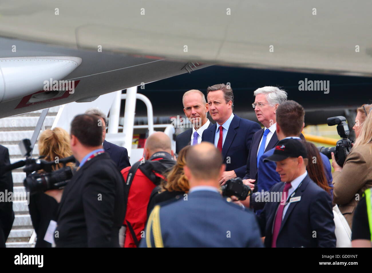 Farnborough, Hampshire, UK. 11th July, 2016. Farnborough International Airshow.  PM Cameron visits a trade stand Credit:  Uwe Deffner/Alamy Live News Stock Photo