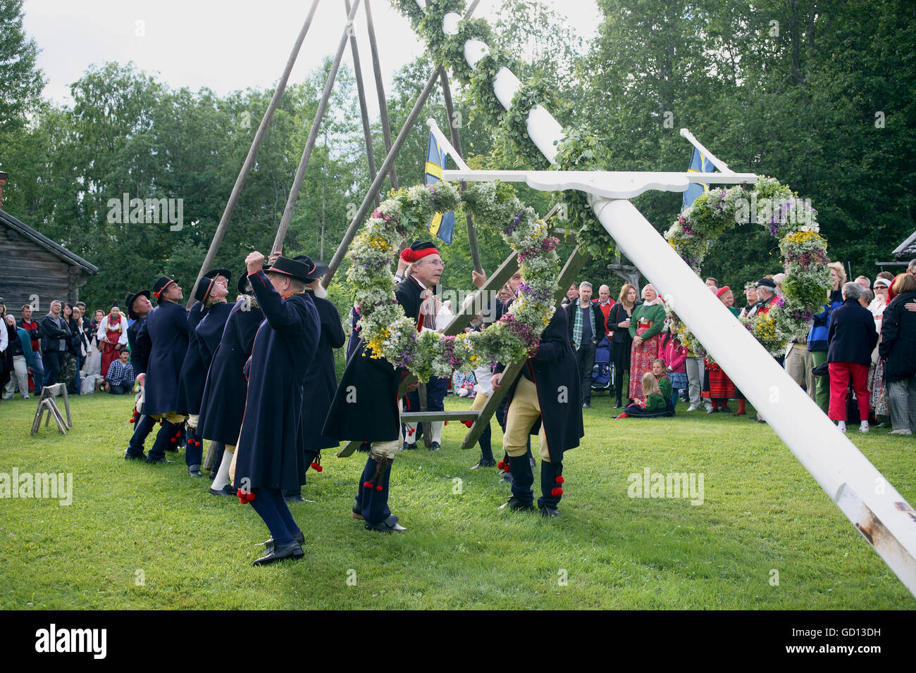 MIDSUMMER people in costumes preparing the festivities Stock Photo