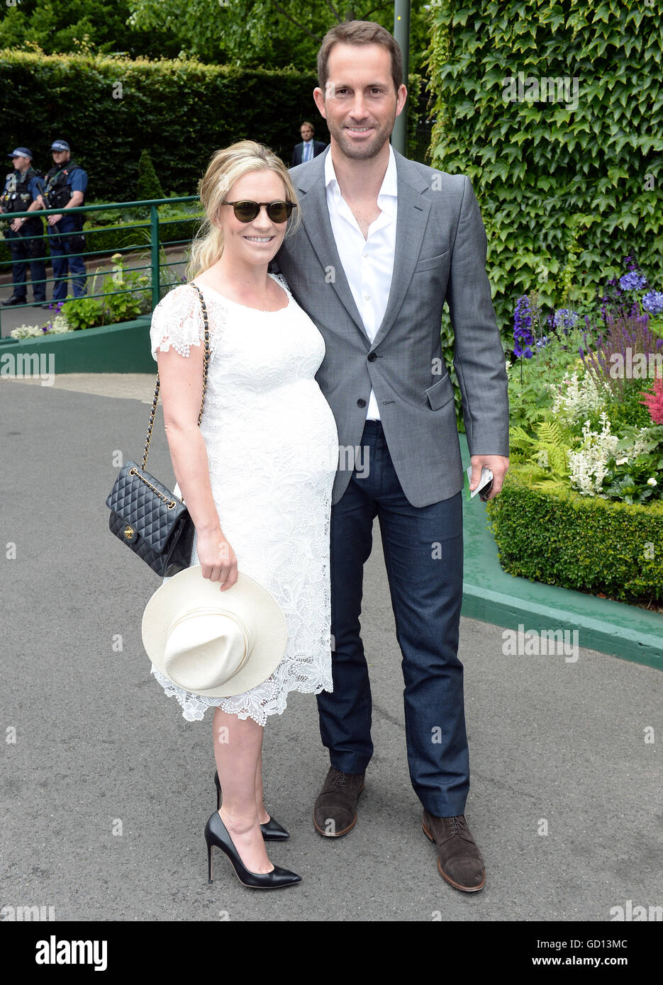 Sir Ben Ainsley and wife Georgie Thompson on day thirteen of the Wimbledon Championships at the All England Lawn Tennis and Croquet Club, Wimbledon. Stock Photo
